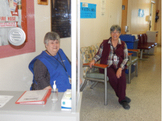 Volunteer working at information desk of hospital